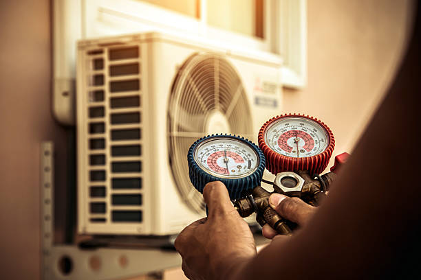 Professional Hvac technician working in Panama City Beach, FL